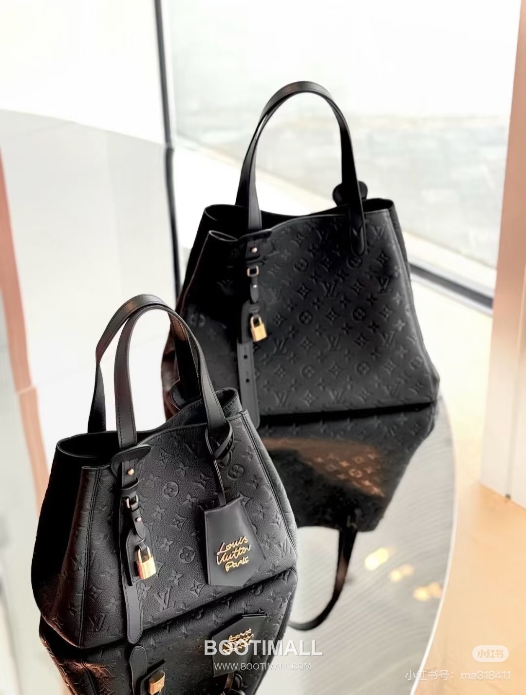 Louis Vuitton All In One Monogram Empreinte Medium Leather Black Tote Bag 루이비통 올 인 원 모노그램 앙프렝뜨 미디엄 레더 블랙 토트백 56.5cm 1