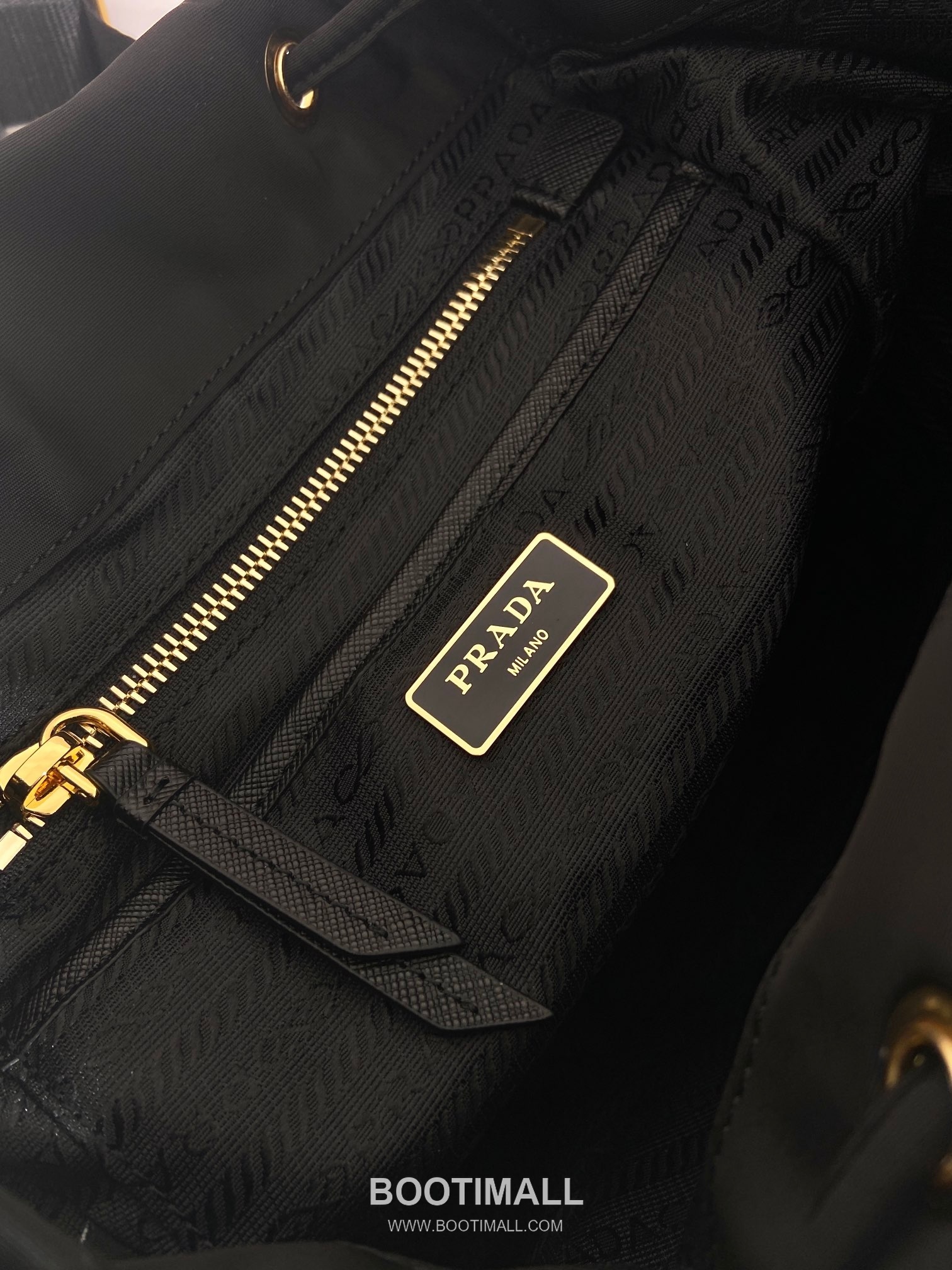 Prada Re-Nylon Backpack with Flap Drawstring Closure and Triple Zip Pocket Detail 프라다 리나일론 플랩 드로우스트링 트리플 지퍼 포켓 백팩 1BZ081 24.5cm 9