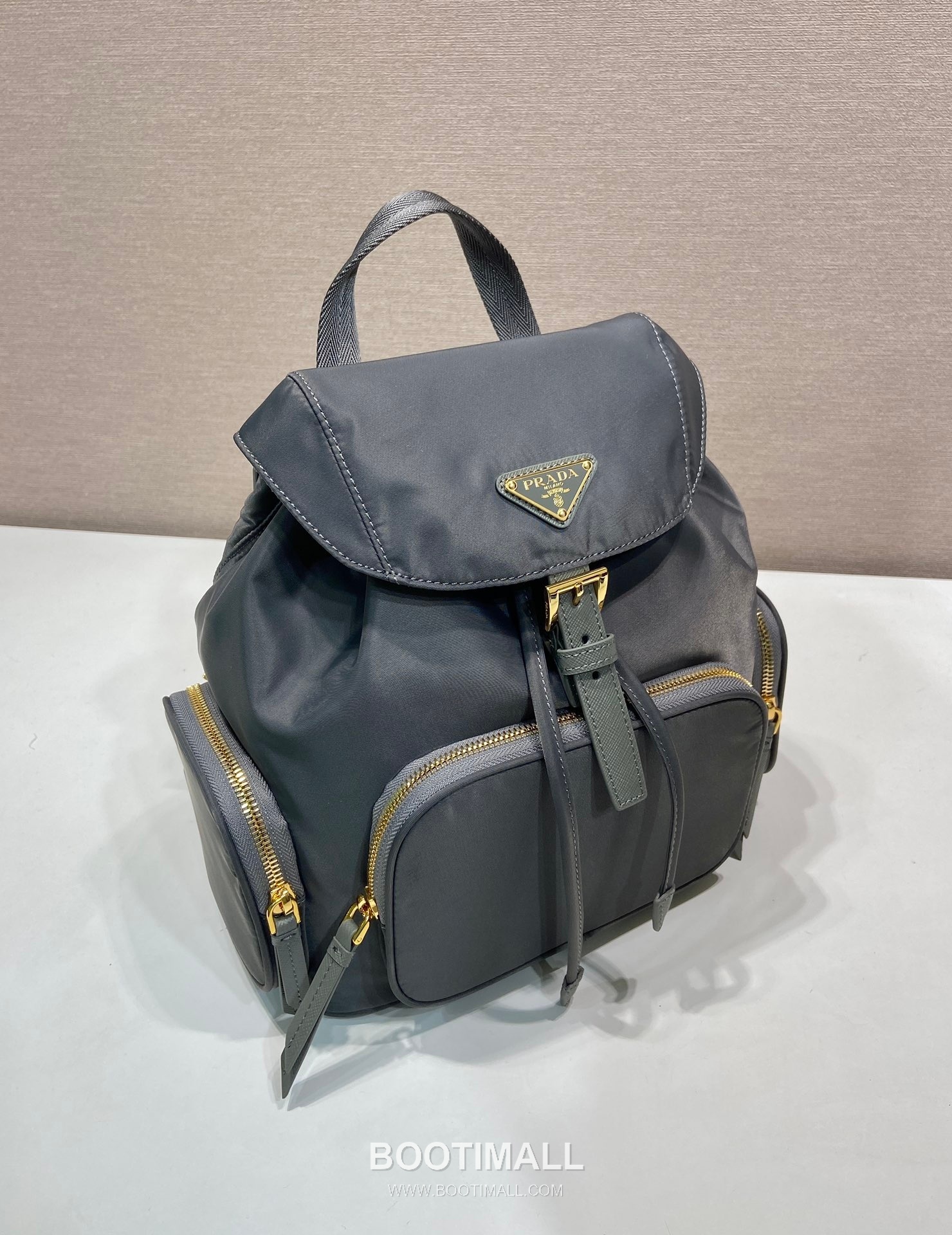 Prada Re-Nylon Backpack with Flap Drawstring Closure and Triple Zip Pocket Detail 프라다 리나일론 플랩 드로우스트링 트리플 지퍼 포켓 백팩 1BZ081 24.5cm 2
