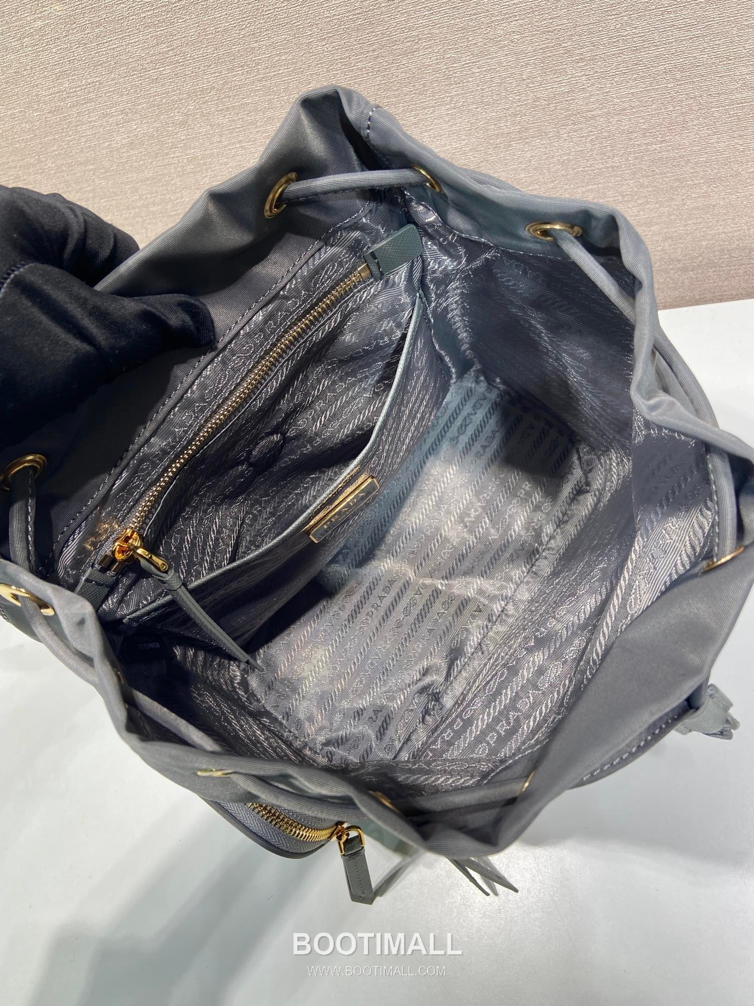 Prada Re-Nylon Backpack with Flap Drawstring Closure and Triple Zip Pocket Detail 프라다 리나일론 플랩 드로우스트링 트리플 지퍼 포켓 백팩 1BZ081 24.5cm 8