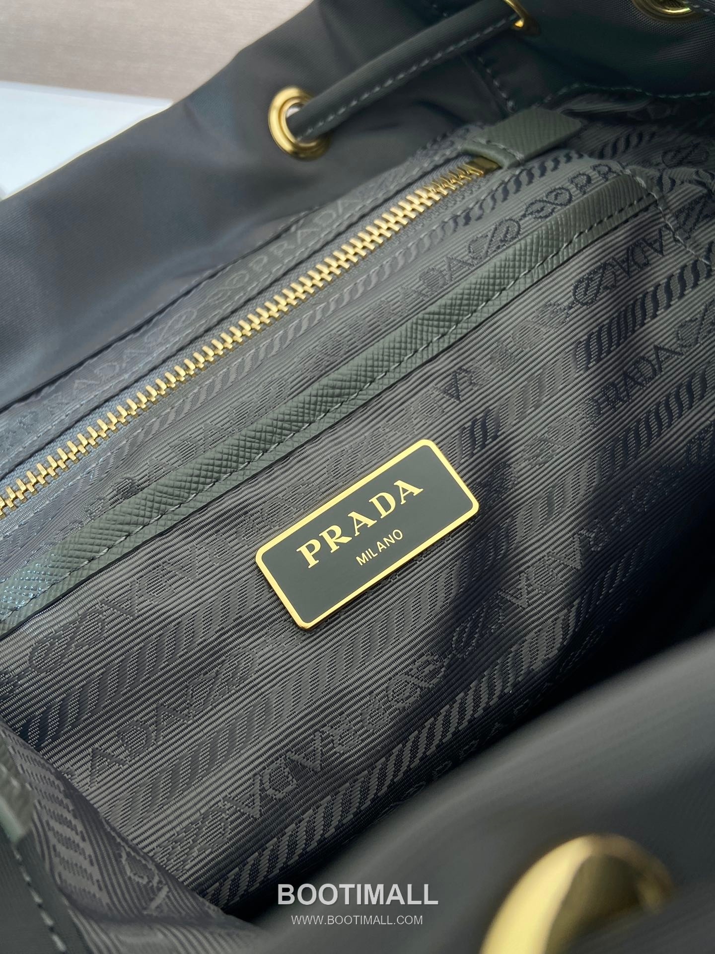 Prada Re-Nylon Backpack with Flap Drawstring Closure and Triple Zip Pocket Detail 프라다 리나일론 플랩 드로우스트링 트리플 지퍼 포켓 백팩 1BZ081 24.5cm 9