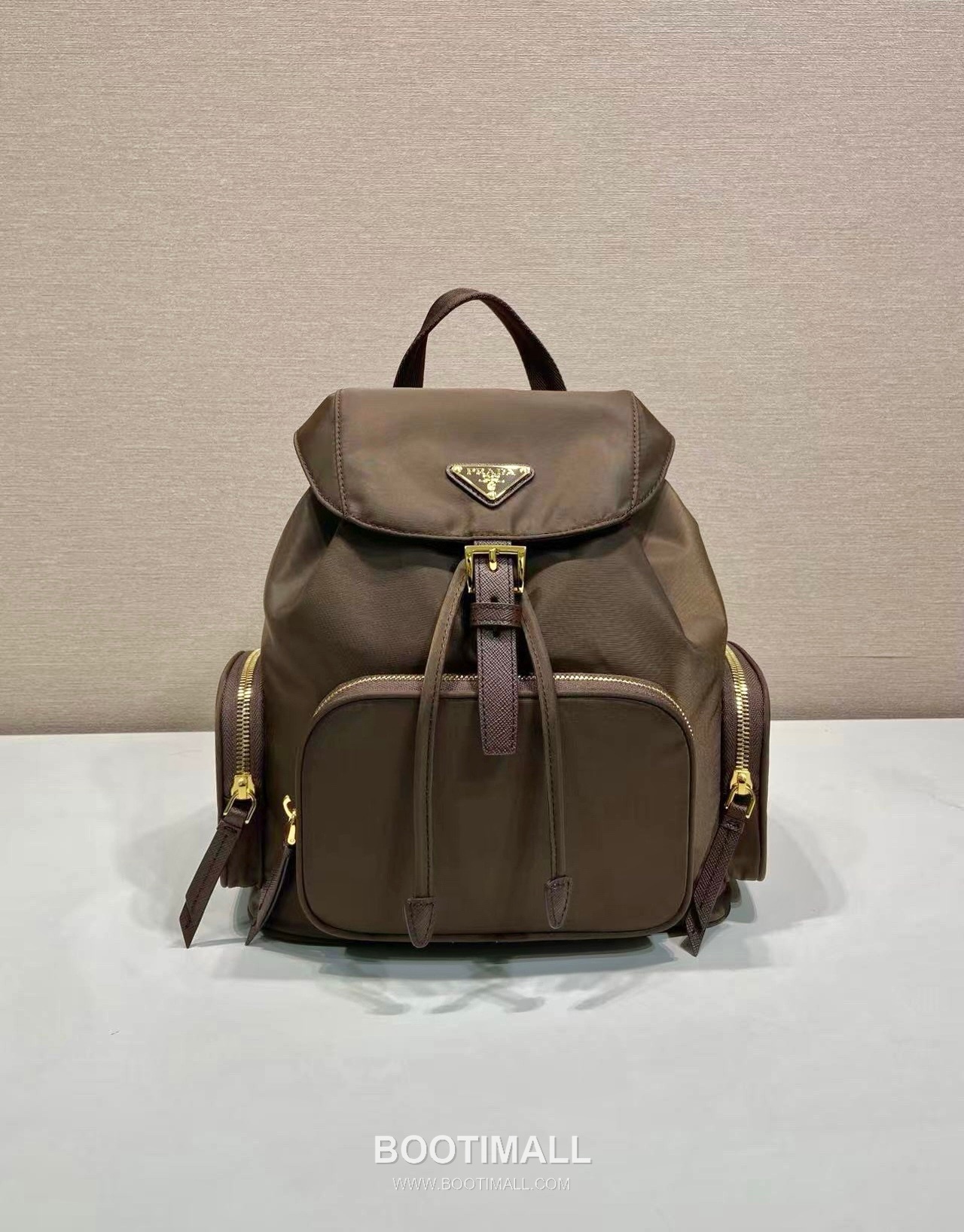 Prada Re-Nylon Backpack with Flap Drawstring Closure and Triple Zip Pocket Detail 프라다 리나일론 플랩 드로우스트링 트리플 지퍼 포켓 백팩 1BZ081 24.5cm 1
