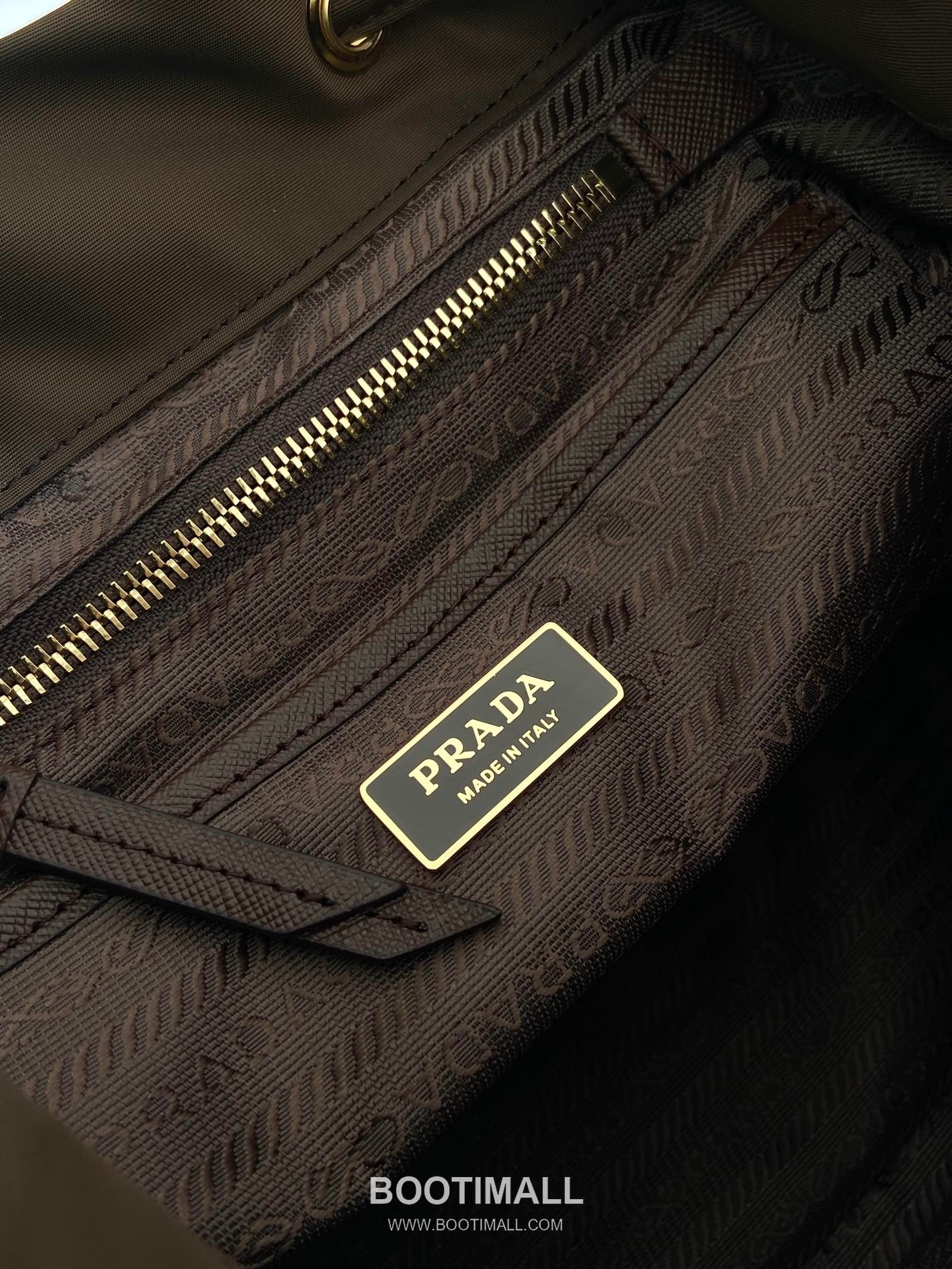 Prada Re-Nylon Backpack with Flap Drawstring Closure and Triple Zip Pocket Detail 프라다 리나일론 플랩 드로우스트링 트리플 지퍼 포켓 백팩 1BZ081 24.5cm 9