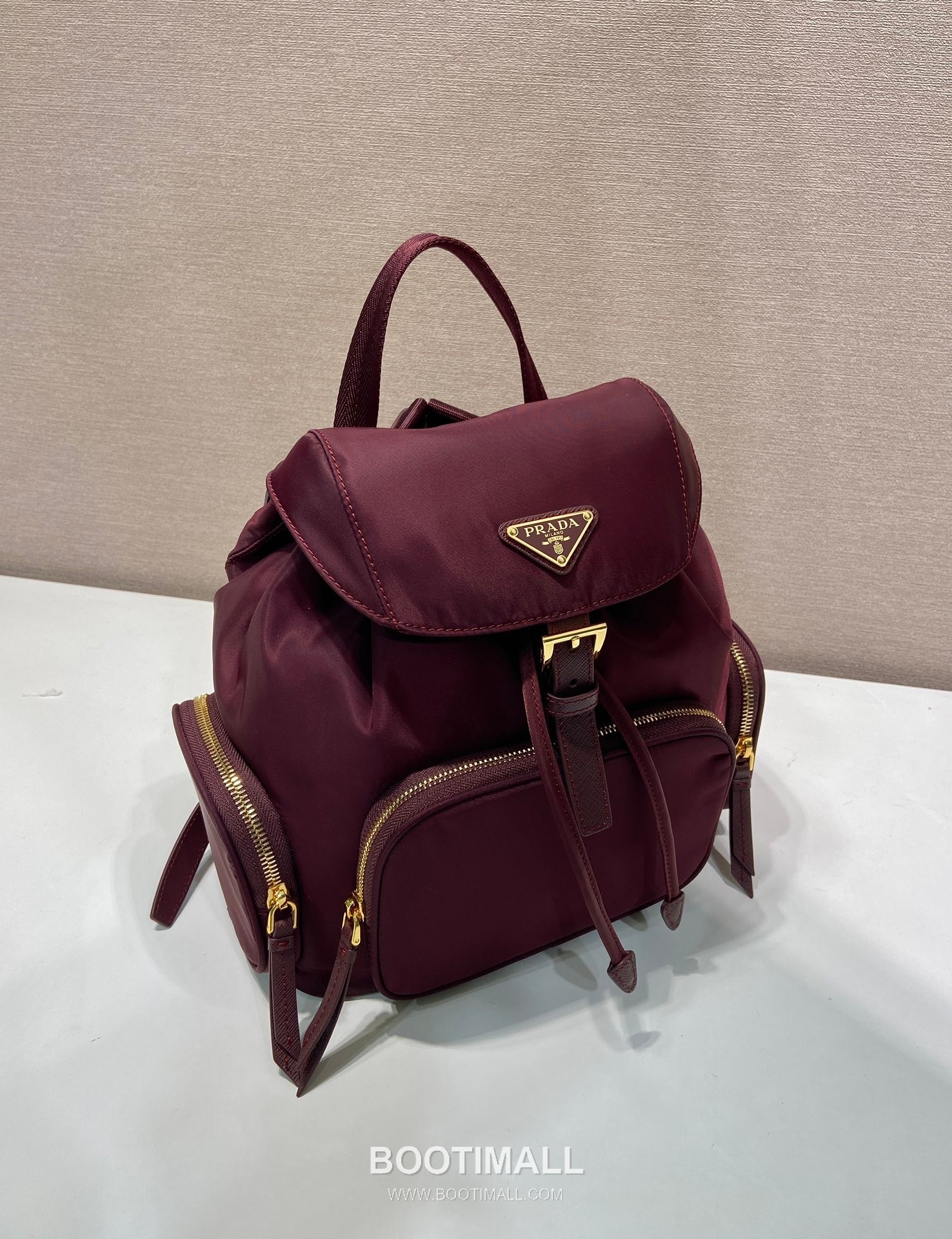 Prada Re-Nylon Backpack with Flap Drawstring Closure and Triple Zip Pocket Detail 프라다 리나일론 플랩 드로우스트링 트리플 지퍼 포켓 백팩 1BZ081 24.5cm 2