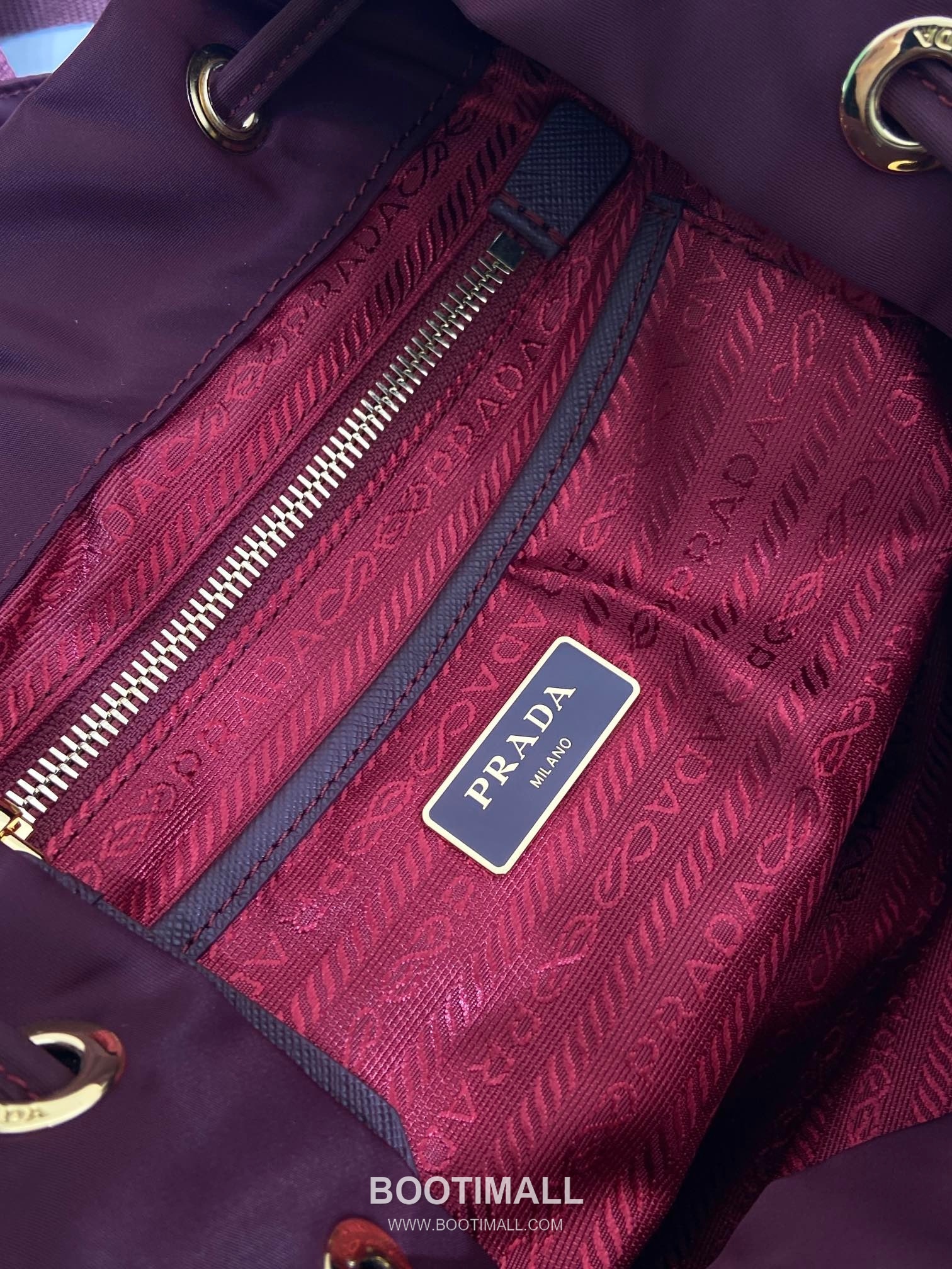 Prada Re-Nylon Backpack with Flap Drawstring Closure and Triple Zip Pocket Detail 프라다 리나일론 플랩 드로우스트링 트리플 지퍼 포켓 백팩 1BZ081 24.5cm 9