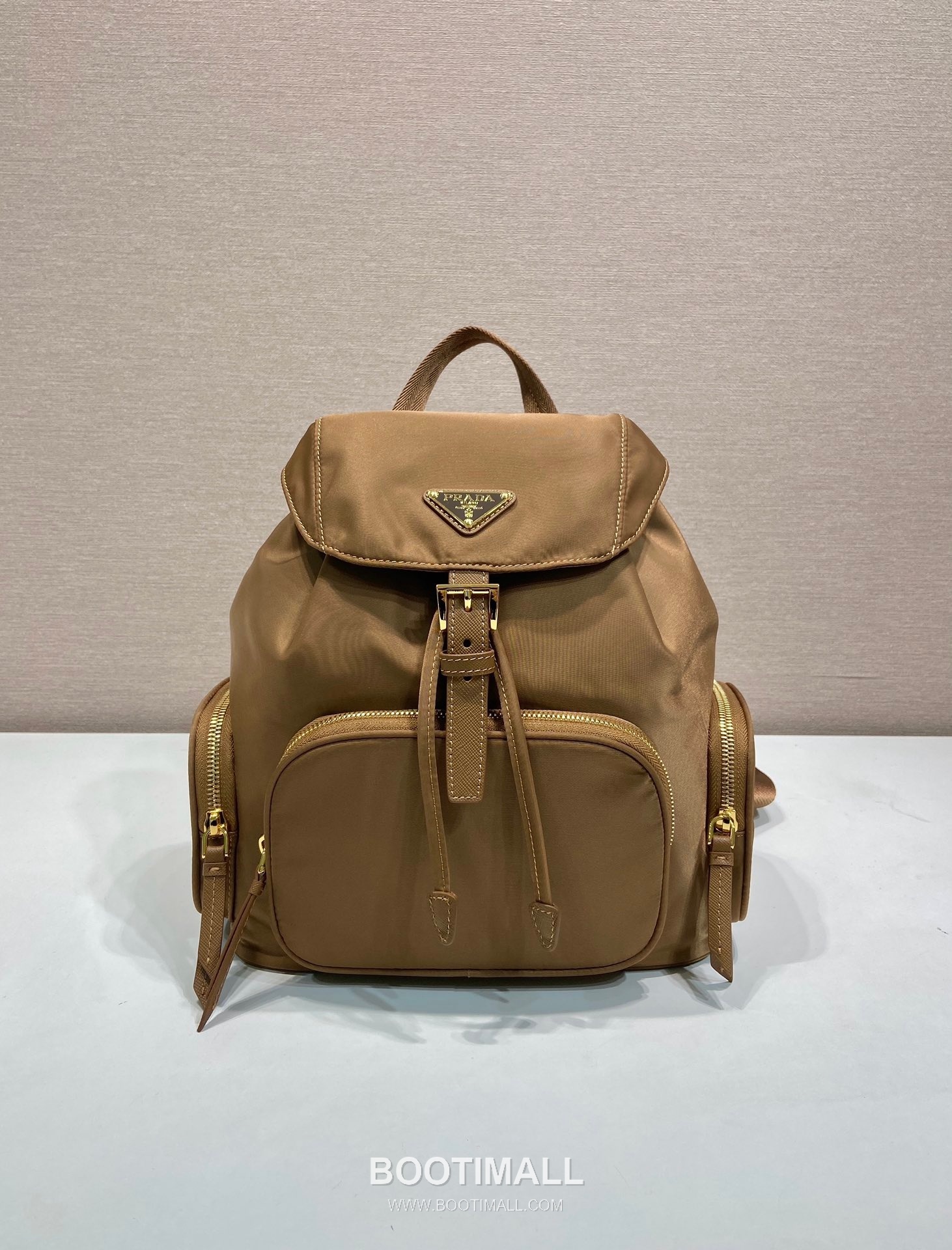 Prada Re-Nylon Backpack with Flap Drawstring Closure and Triple Zip Pocket Detail 프라다 리나일론 플랩 드로우스트링 트리플 지퍼 포켓 백팩 1BZ081 24.5cm 1