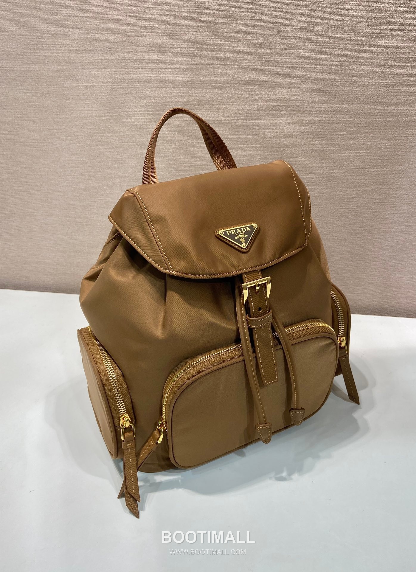 Prada Re-Nylon Backpack with Flap Drawstring Closure and Triple Zip Pocket Detail 프라다 리나일론 플랩 드로우스트링 트리플 지퍼 포켓 백팩 1BZ081 24.5cm 2