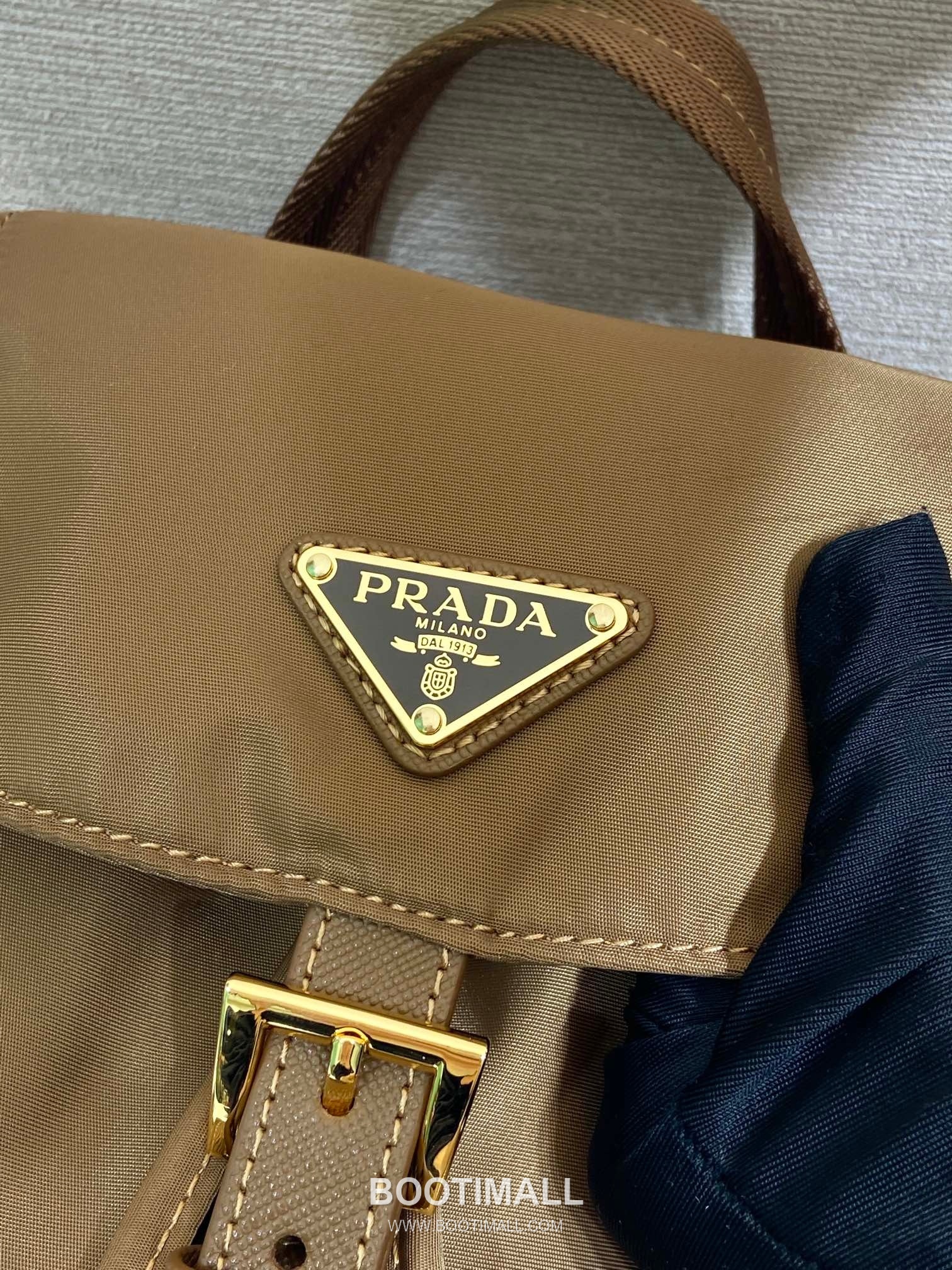 Prada Re-Nylon Backpack with Flap Drawstring Closure and Triple Zip Pocket Detail 프라다 리나일론 플랩 드로우스트링 트리플 지퍼 포켓 백팩 1BZ081 24.5cm 7