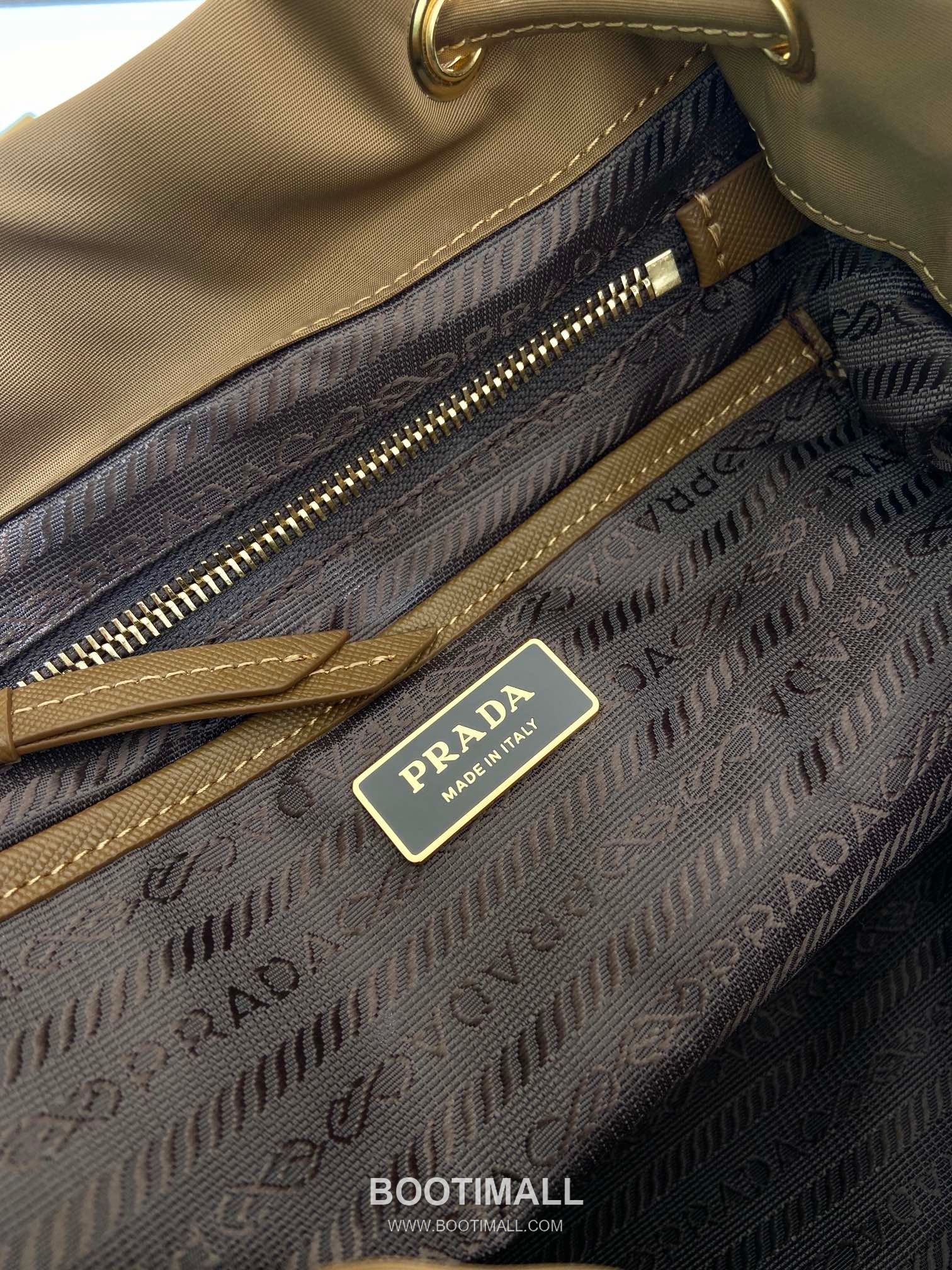 Prada Re-Nylon Backpack with Flap Drawstring Closure and Triple Zip Pocket Detail 프라다 리나일론 플랩 드로우스트링 트리플 지퍼 포켓 백팩 1BZ081 24.5cm 9