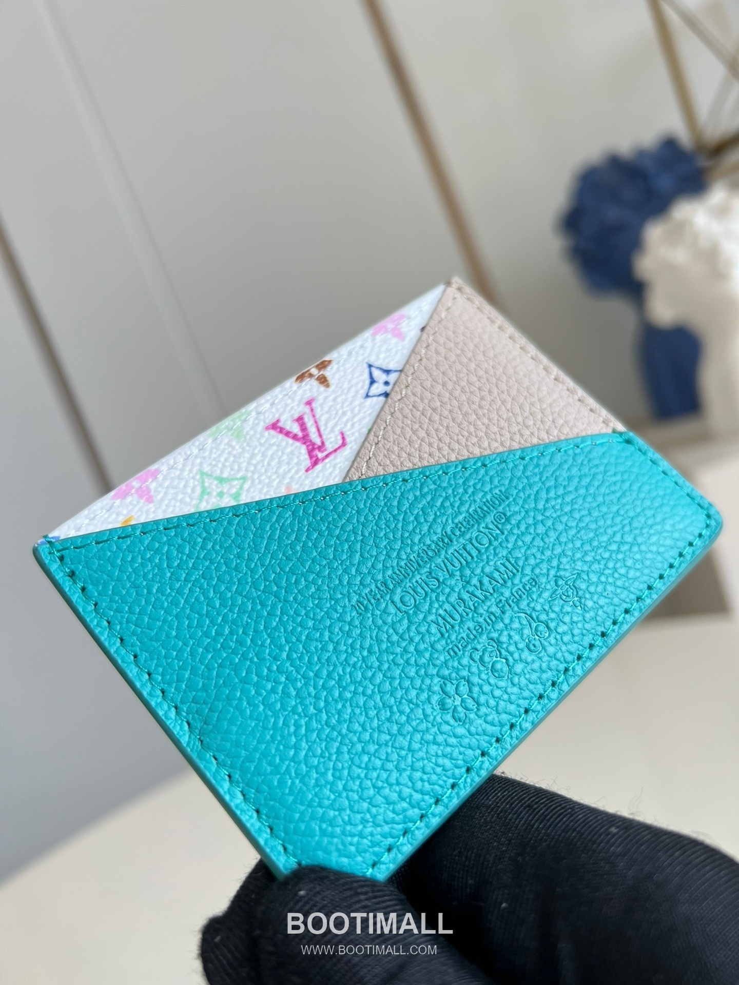Louis Vuitton x Takashi Murakami Criss-Cross Calfskin Leather Card Holder with Monogram Canvas Detail 루이비통 x 무라카미 다카시 크리스크로스 카프스킨 레더 카드홀더 M14090 10cm 2