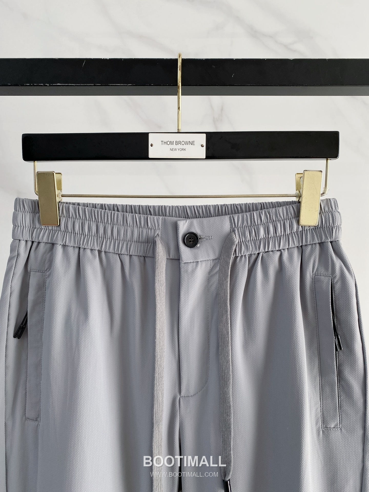 Prada 2026 SS Lyocell Nylon Stretch Pants with Logo Detail 프라다 2026 SS 텐셀 나일론 스트레치 팬츠 로고 디테일 2