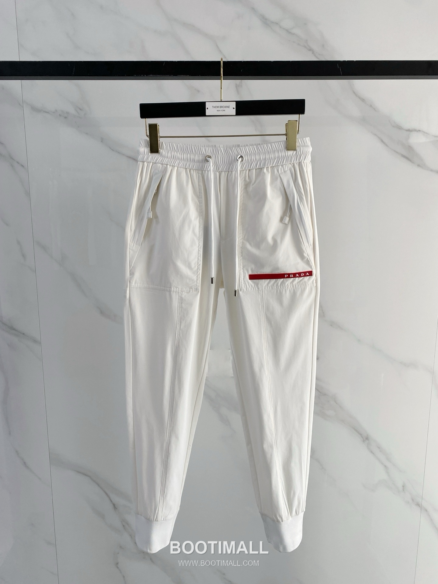 Prada 2026 SS Lyocell Nylon Stretch Pants with Logo Detail 프라다 2026 SS 텐셀 나일론 스트레치 팬츠 로고 디테일 1