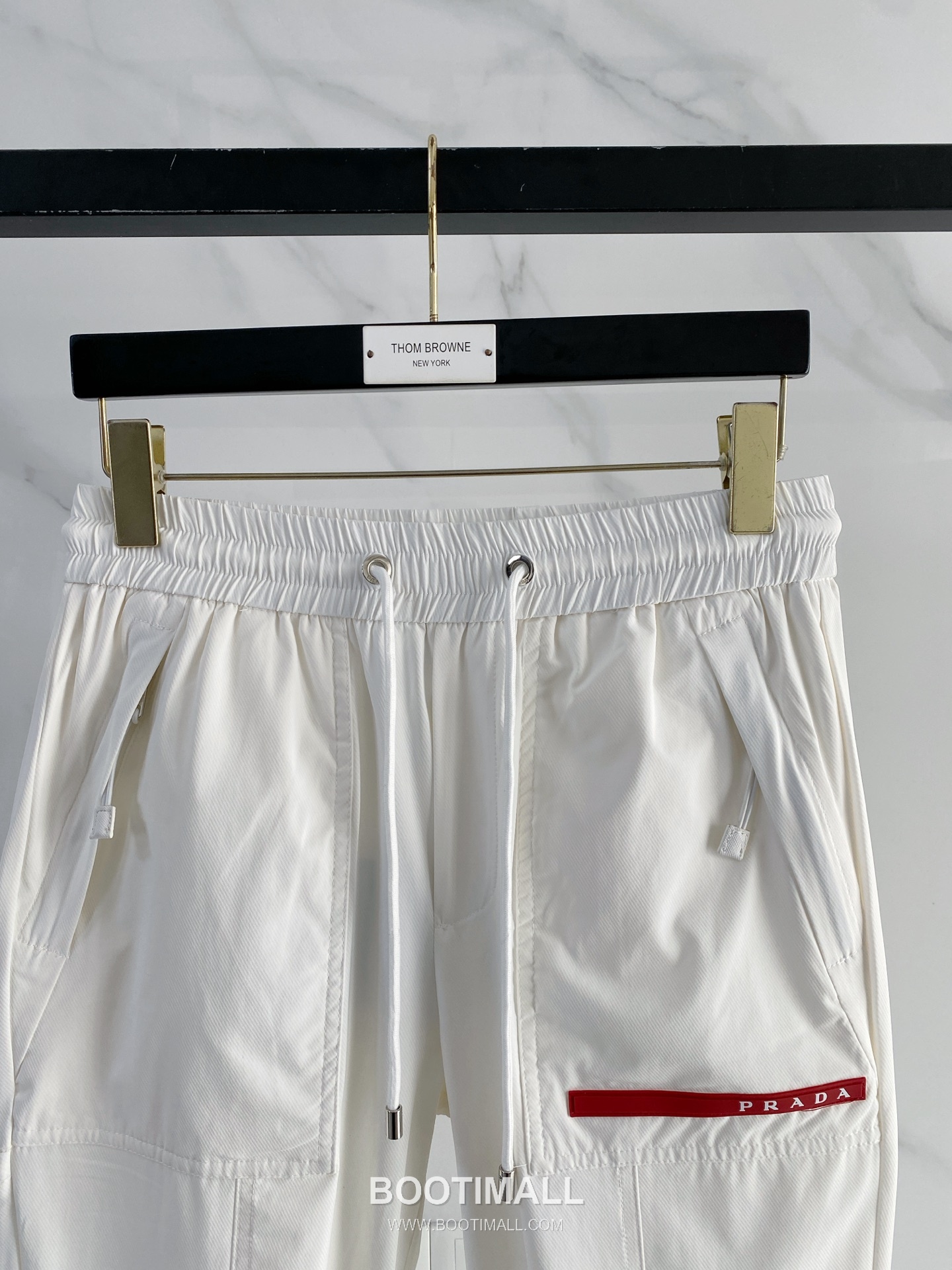 Prada 2026 SS Lyocell Nylon Stretch Pants with Logo Detail 프라다 2026 SS 텐셀 나일론 스트레치 팬츠 로고 디테일 2