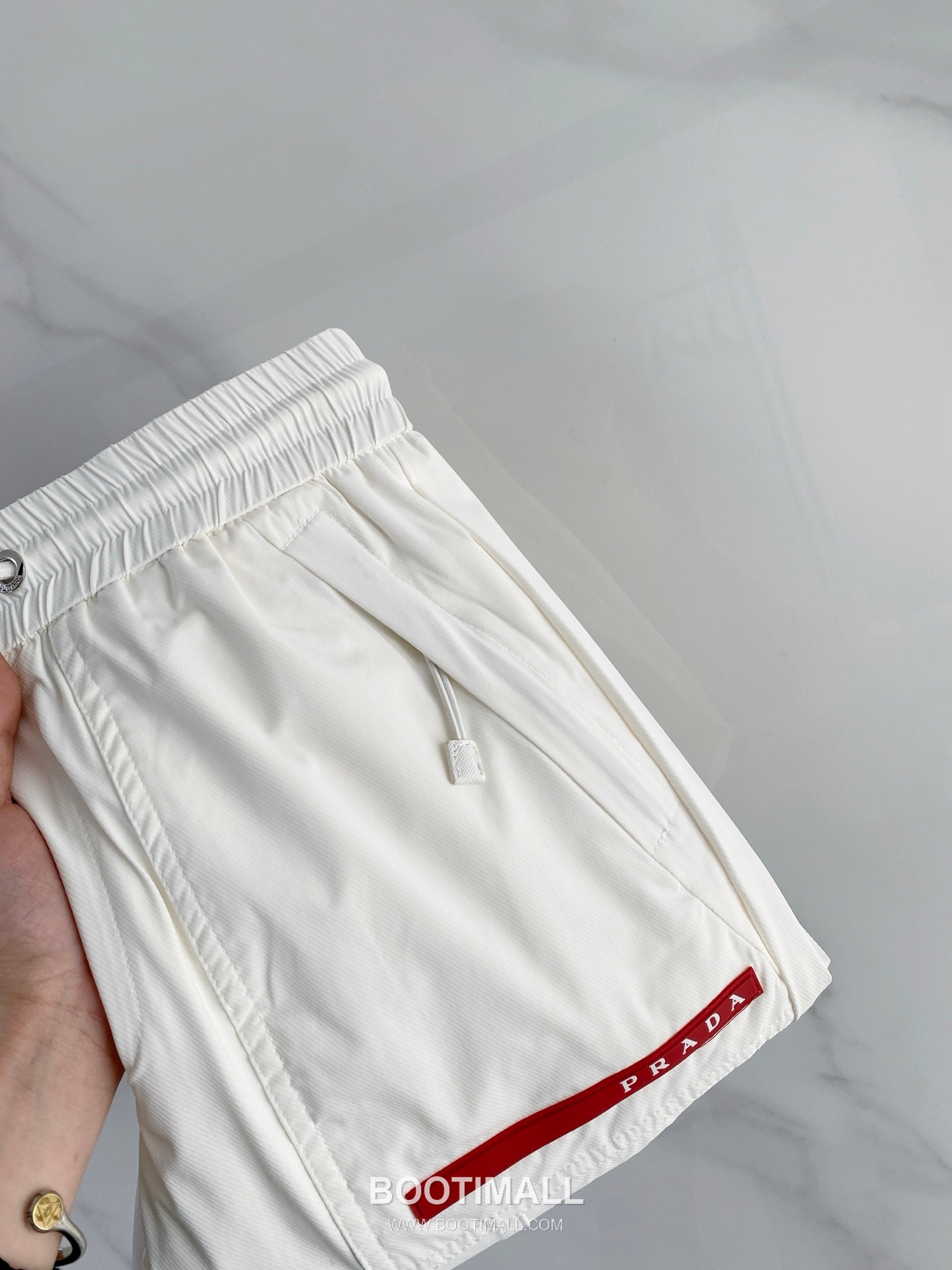 Prada 2026 SS Lyocell Nylon Stretch Pants with Logo Detail 프라다 2026 SS 텐셀 나일론 스트레치 팬츠 로고 디테일 9