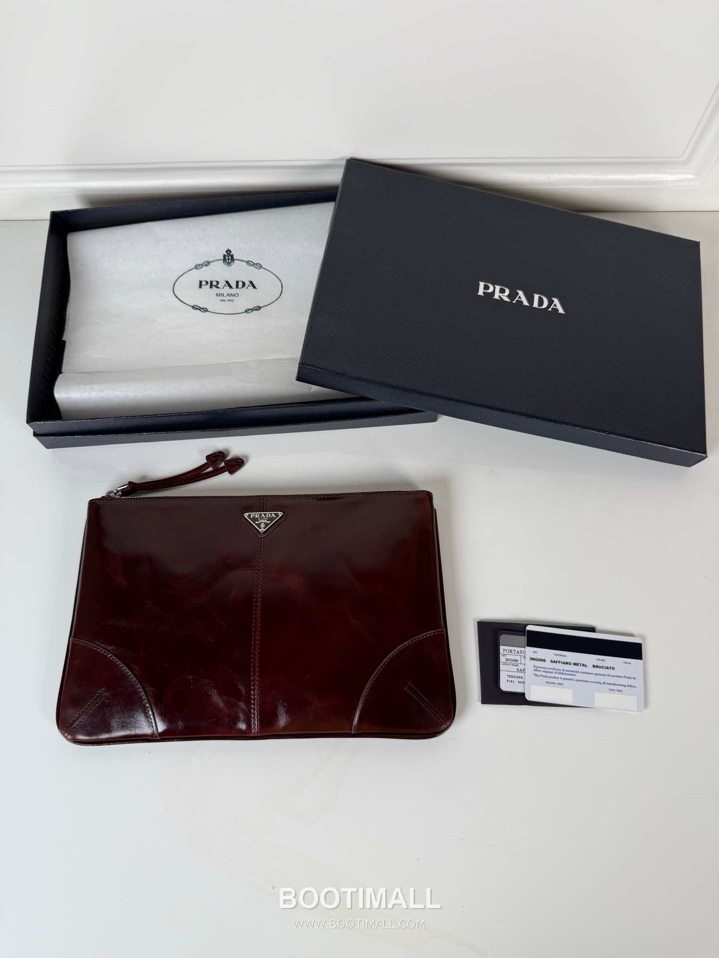 Prada Oiled Wax Leather Clutch Bag with Triangle Logo and Zip Closure 프라다 오일드 왁스 레더 트라이앵글 로고 지퍼 클러치백 2NH006A 28cm 1