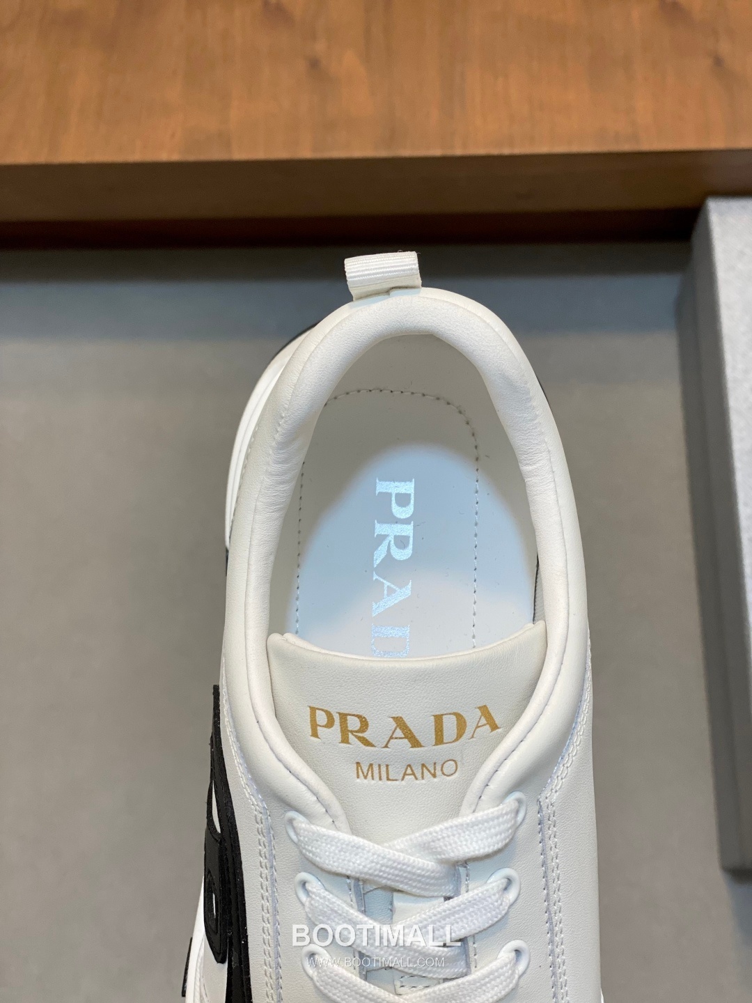 Prada Calfskin Leather Geometric Stitch Sneakers with Logo Lace Detail Rubber Sole 프라다 카프스킨 레더 지오메트릭 스티치 스니커즈 로고 레이스 디테일 러버솔 7F03041 2.5cm 7