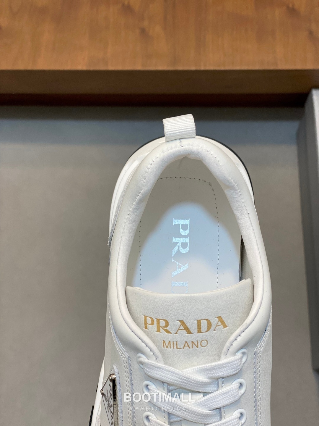 Prada Calfskin Leather Geometric Stitch Sneakers with Logo Lace Detail Rubber Sole 프라다 카프스킨 레더 지오메트릭 스티치 스니커즈 로고 레이스 디테일 러버솔 7F03041 2.5cm 7