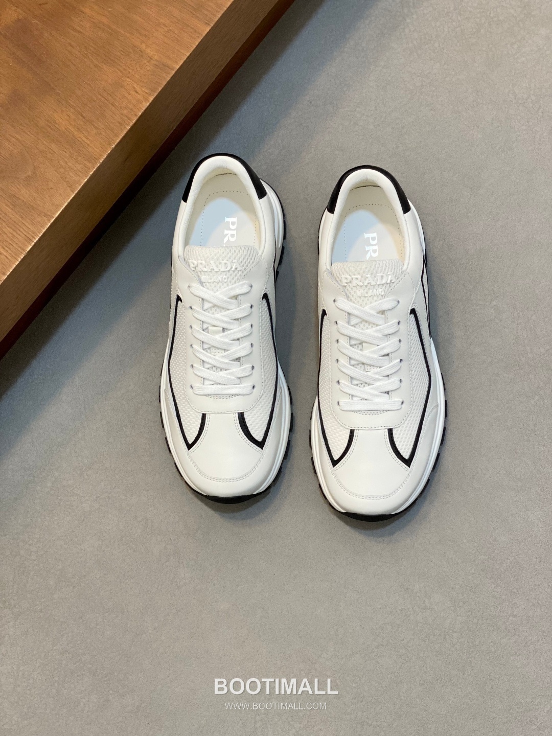 Prada Calfskin Leather Geometric Stitch Sneakers with Logo Tongue Lace Detail Rubber Sole 프라다 카프스킨 레더 지오메트릭 스티치 스니커즈 로고 텅 레이스 디테일 러버솔 7F03041 2.5cm 1