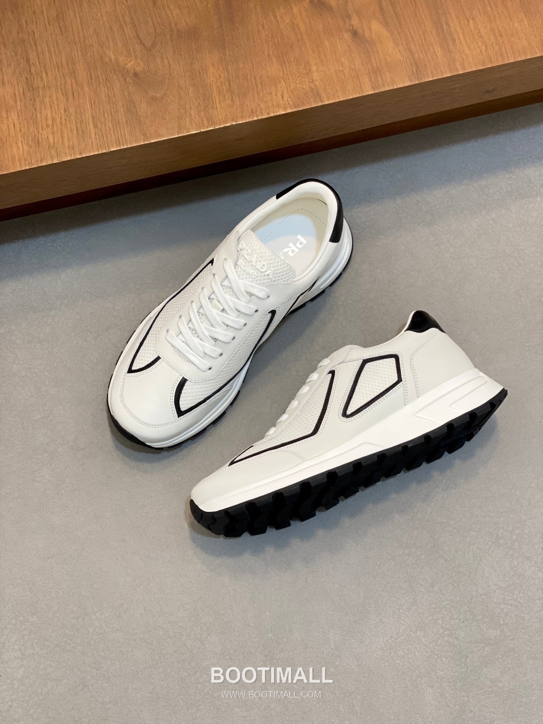 Prada Calfskin Leather Geometric Stitch Sneakers with Logo Tongue Lace Detail Rubber Sole 프라다 카프스킨 레더 지오메트릭 스티치 스니커즈 로고 텅 레이스 디테일 러버솔 7F03041 2.5cm 5