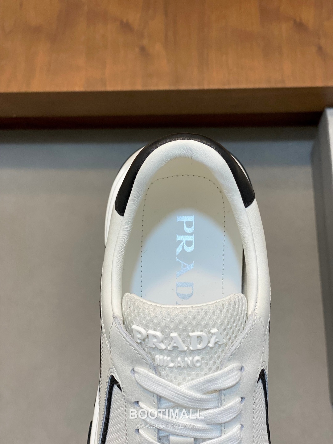 Prada Calfskin Leather Geometric Stitch Sneakers with Logo Tongue Lace Detail Rubber Sole 프라다 카프스킨 레더 지오메트릭 스티치 스니커즈 로고 텅 레이스 디테일 러버솔 7F03041 2.5cm 7