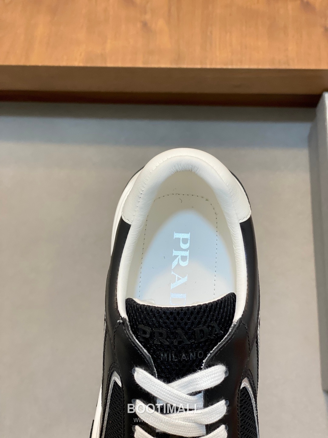 Prada Calfskin Leather Geometric Stitch Sneakers with Logo Tongue Lace Detail Rubber Sole 프라다 카프스킨 레더 지오메트릭 스티치 스니커즈 로고 텅 레이스 디테일 러버솔 7F03041 2.5cm 7