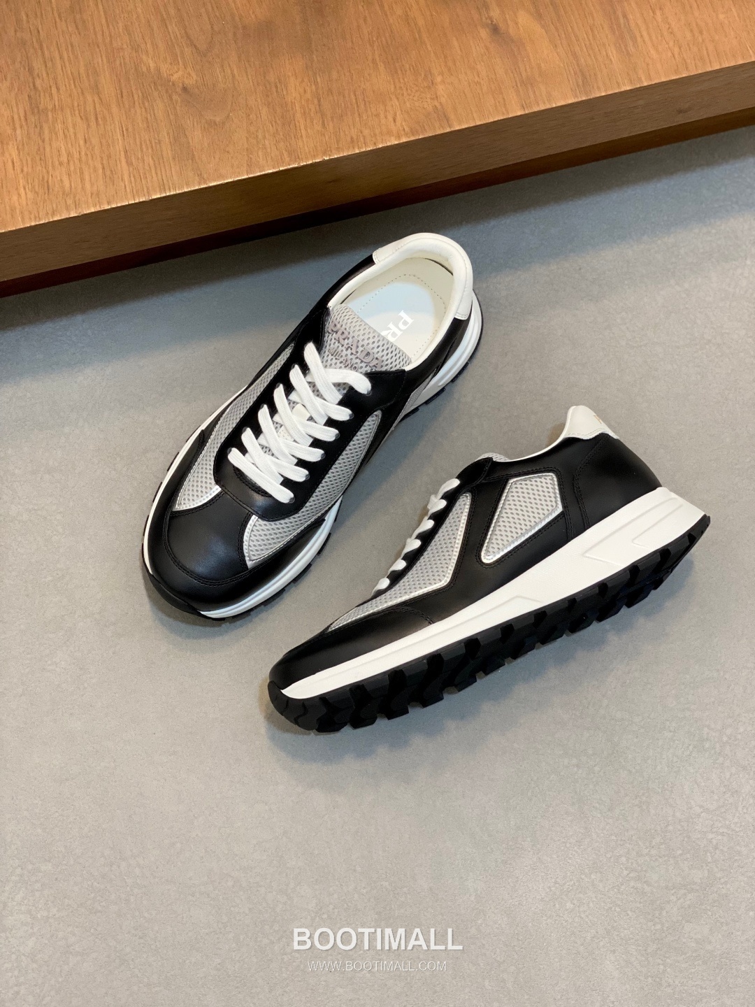 Prada Calfskin Leather Geometric Stitch Sneakers with Logo Tongue Lace Detail Rubber Sole 프라다 카프스킨 레더 지오메트릭 스티치 스니커즈 로고 텅 레이스 디테일 러버솔 7F03041 2.5cm 5