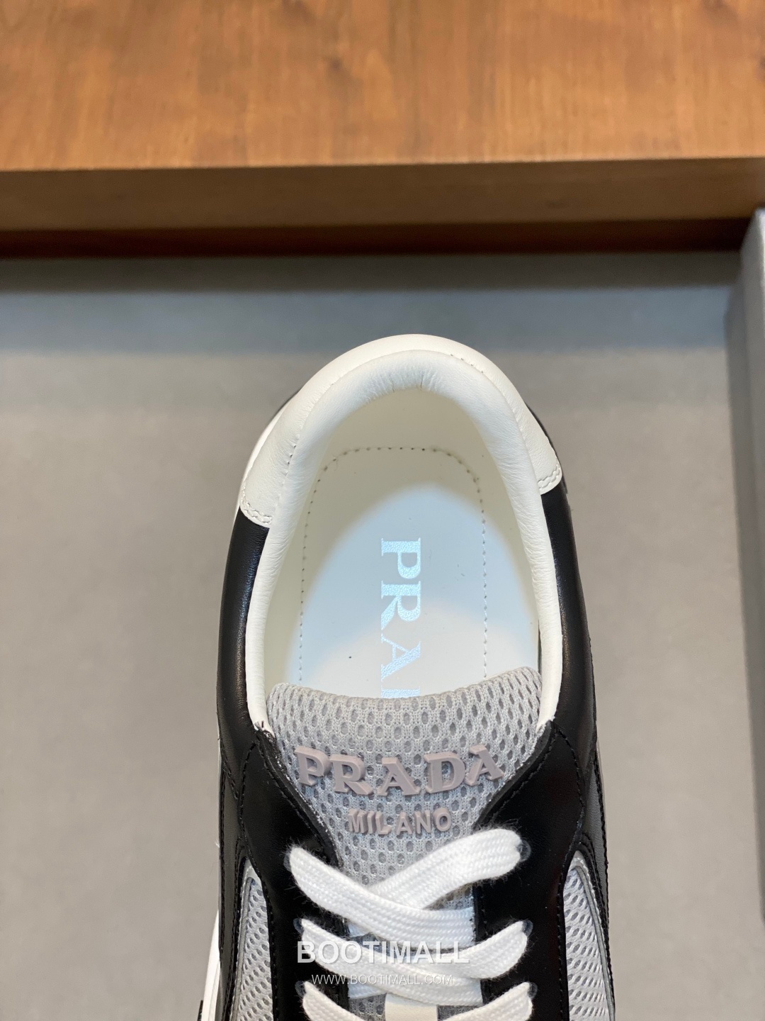 Prada Calfskin Leather Geometric Stitch Sneakers with Logo Tongue Lace Detail Rubber Sole 프라다 카프스킨 레더 지오메트릭 스티치 스니커즈 로고 텅 레이스 디테일 러버솔 7F03041 2.5cm 7