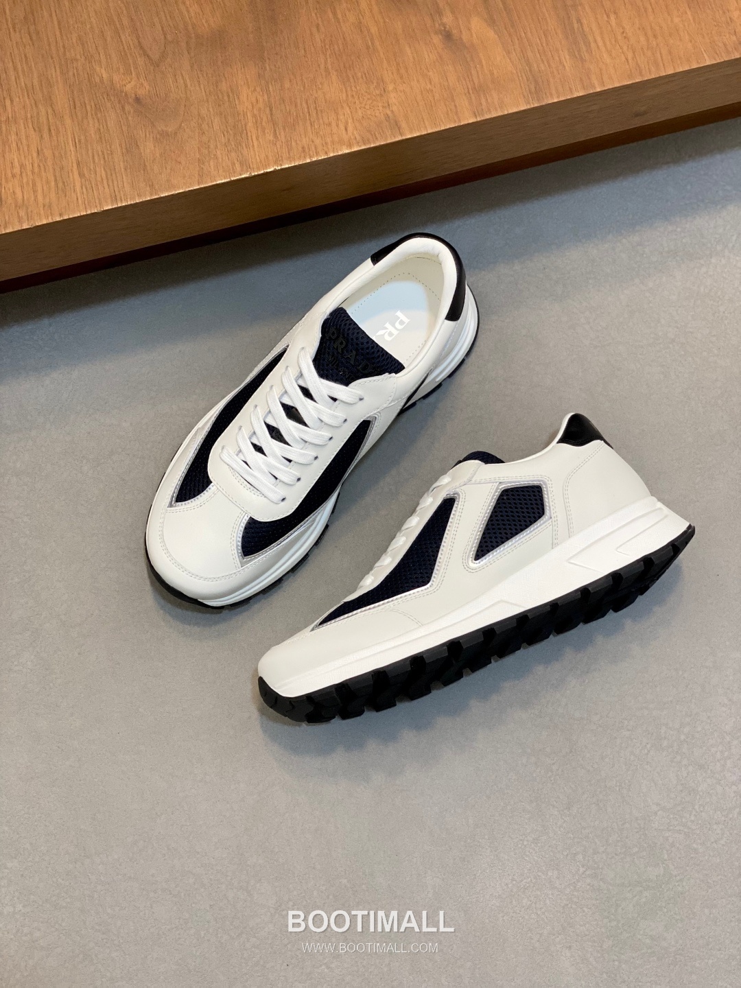 Prada Calfskin Leather Geometric Stitch Sneakers with Logo Tongue Lace Detail Rubber Sole 프라다 카프스킨 레더 지오메트릭 스티치 스니커즈 로고 텅 레이스 디테일 러버솔 7F03041 2.5cm 5