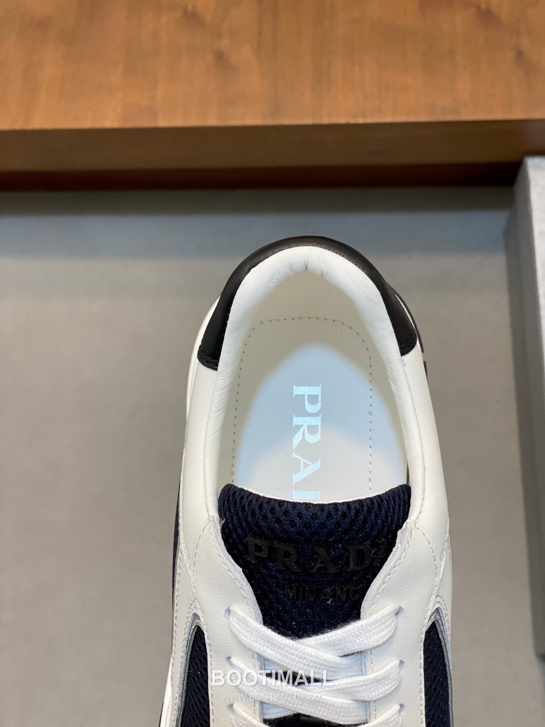 Prada Calfskin Leather Geometric Stitch Sneakers with Logo Tongue Lace Detail Rubber Sole 프라다 카프스킨 레더 지오메트릭 스티치 스니커즈 로고 텅 레이스 디테일 러버솔 7F03041 2.5cm 7