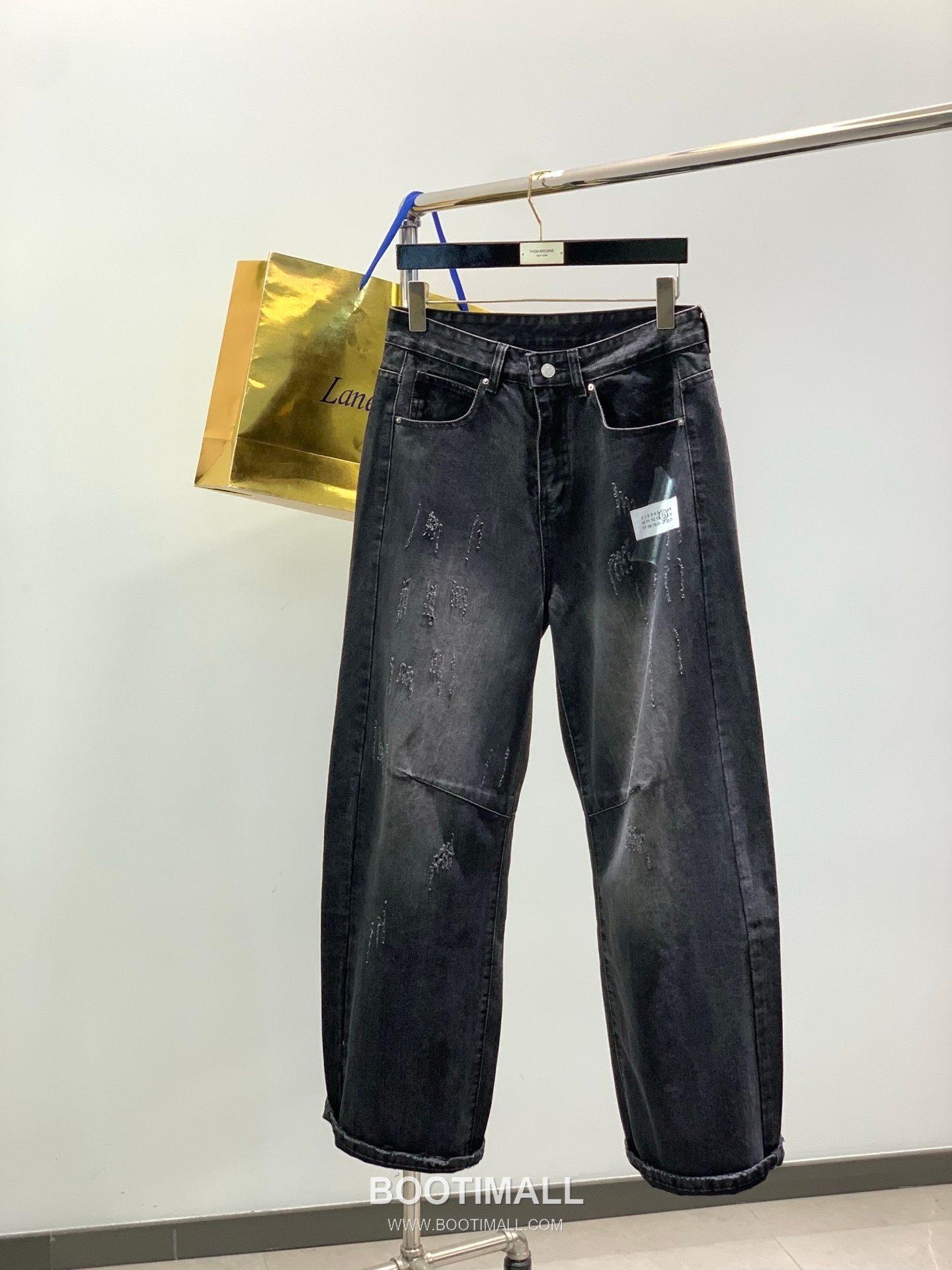Maison Margiela SS26 Washed Denim Pants with Logo Print 메종마르지엘라 SS26 워시드 데님 팬츠 로고 프린트 1